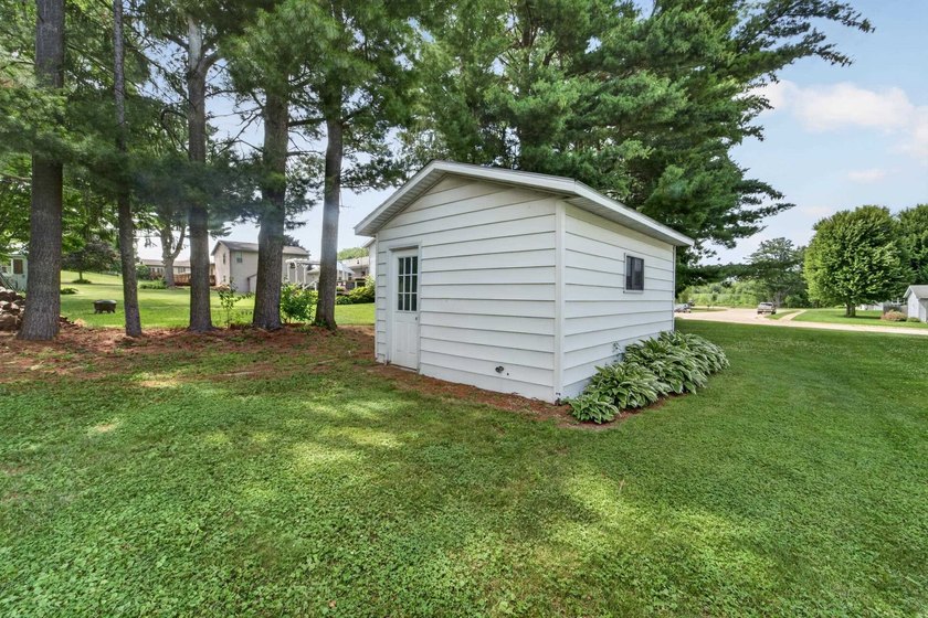 Welcome home to this charming 3-bedroom ranch in the heart of - photo 34