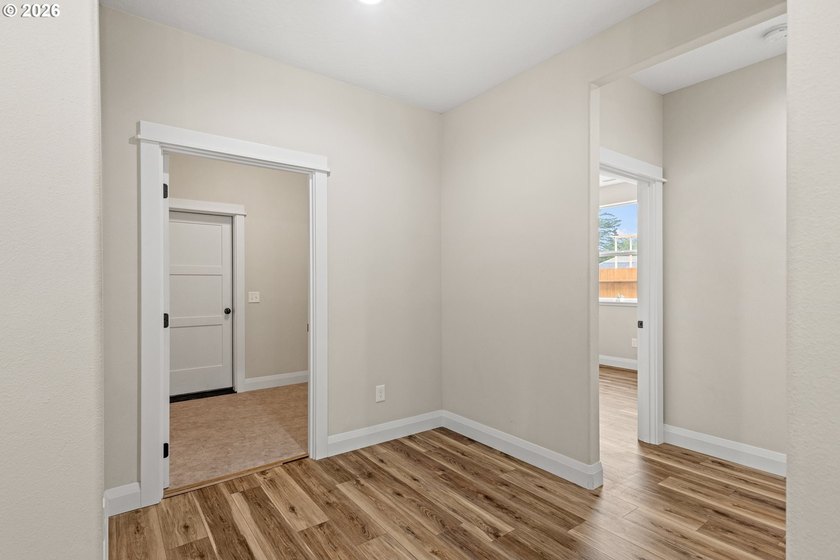 Experience modern coastal living in this custom-built 2023 home - photo 27