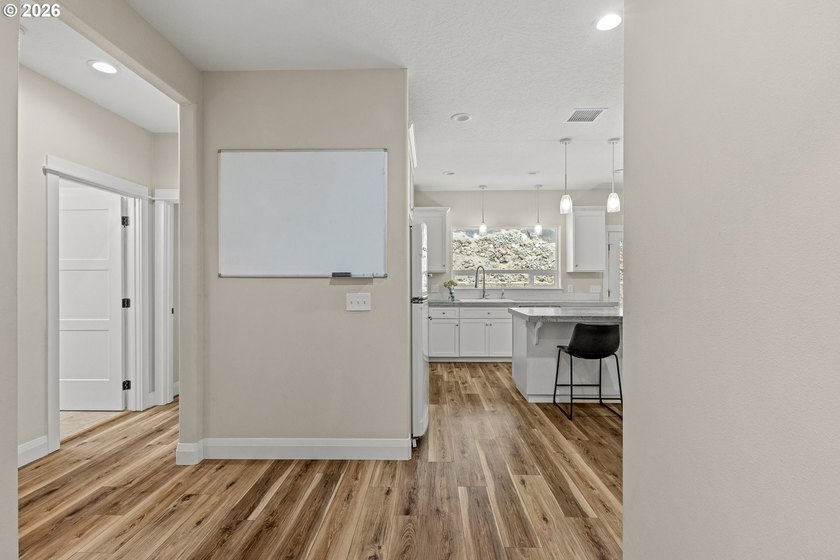 Experience modern coastal living in this custom-built 2023 home - photo 29