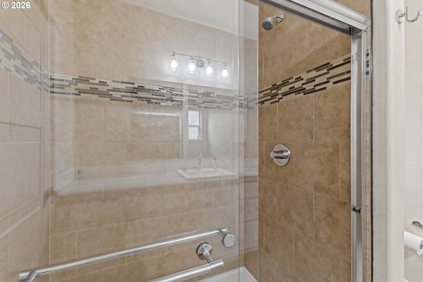 Experience modern coastal living in this custom-built 2023 home - photo 40