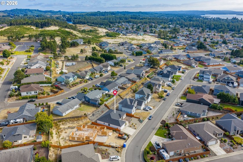 Experience modern coastal living in this custom-built 2023 home - photo 45