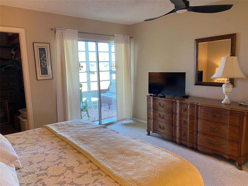WATER VIEW ! FROM THIS 2ND FLOOR, MOVE IN READY UNIT. FULLY - photo 11