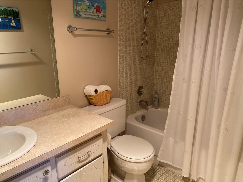 WATER VIEW ! FROM THIS 2ND FLOOR, MOVE IN READY UNIT. FULLY - photo 12