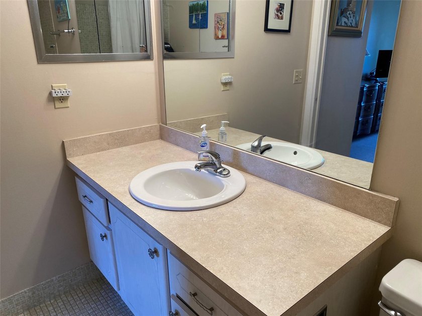 WATER VIEW ! FROM THIS 2ND FLOOR, MOVE IN READY UNIT. FULLY - photo 13