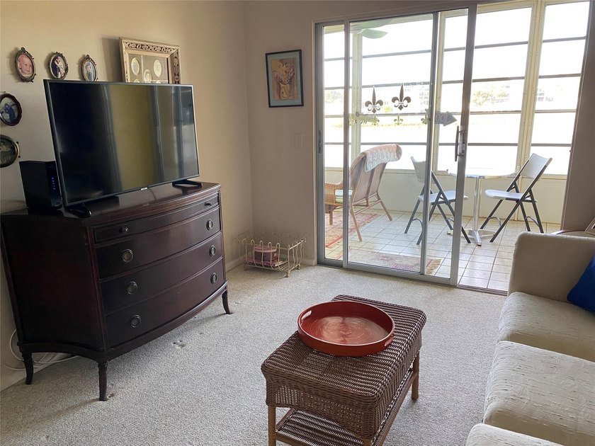 WATER VIEW ! FROM THIS 2ND FLOOR, MOVE IN READY UNIT. FULLY - photo 17