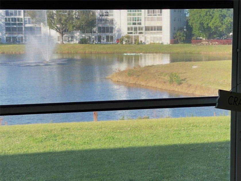 WATER VIEW ! FROM THIS 2ND FLOOR, MOVE IN READY UNIT. FULLY - photo 19