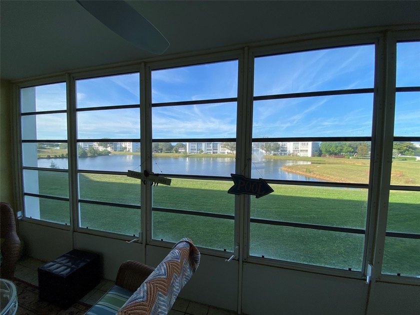 WATER VIEW ! FROM THIS 2ND FLOOR, MOVE IN READY UNIT. FULLY - photo 22