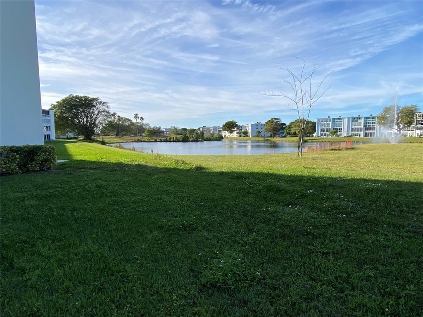 WATER VIEW ! FROM THIS 2ND FLOOR, MOVE IN READY UNIT. FULLY - photo 29