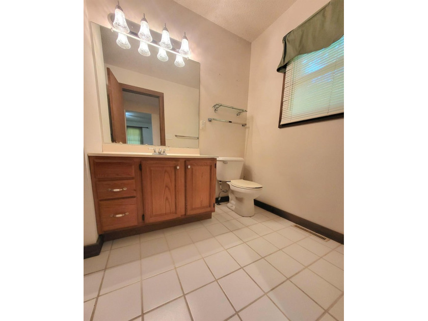 Cabin vibes, wooded views, extra lot, under $300,000.00. Located - photo 13
