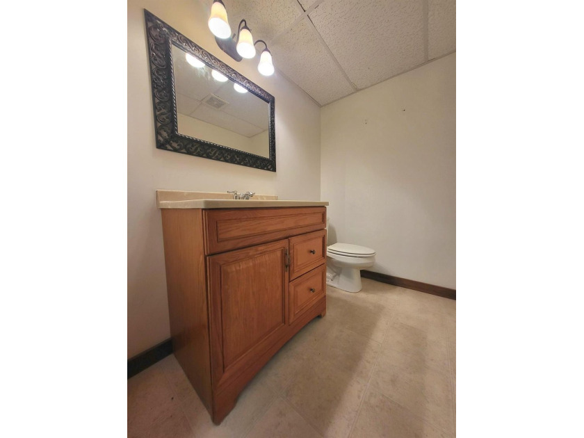 Cabin vibes, wooded views, extra lot, under $300,000.00. Located - photo 16