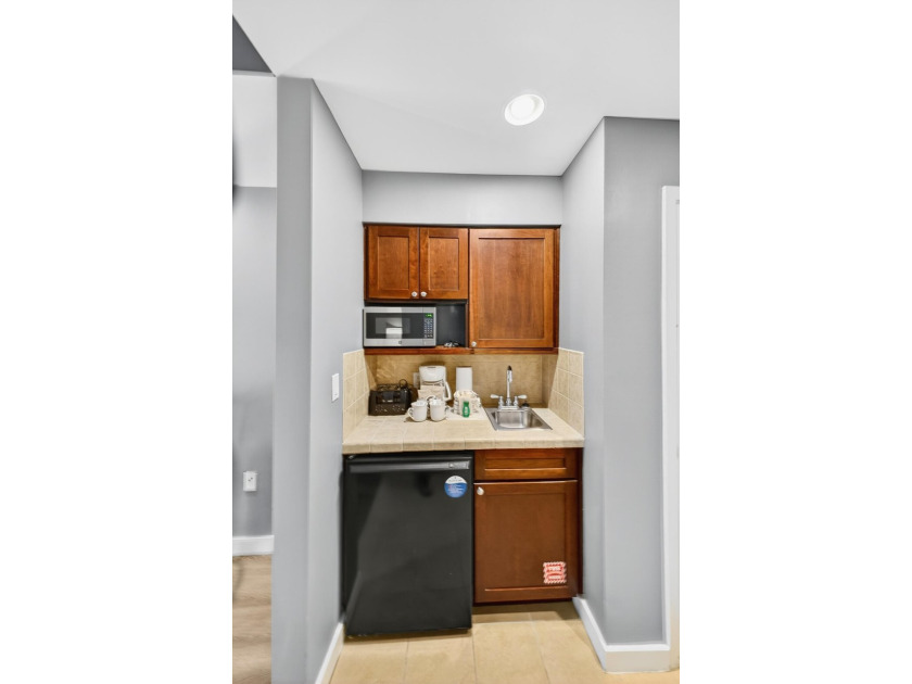 Discover a rare opportunity to own two condos in one -- a - photo 31