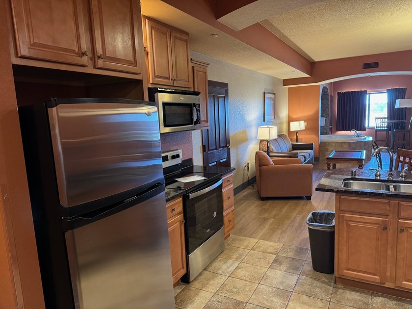 Located on the fifth floor, this spacious three bedroom condo - photo 9