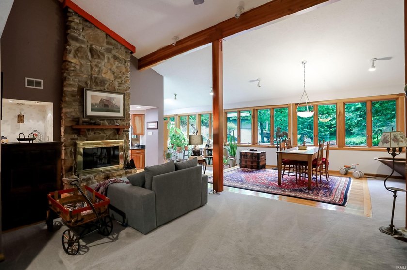 Set on nearly 6 wooded acres, this contemporary custom home - photo 11