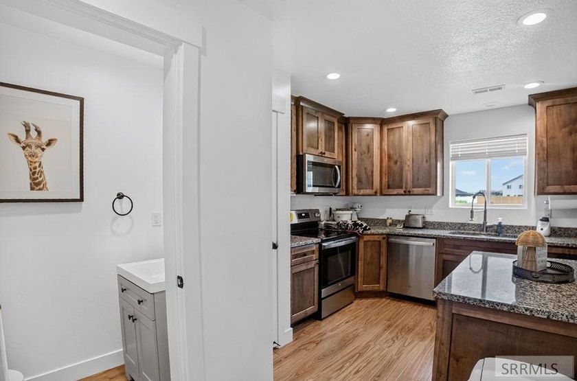 Welcome to 85 E Legacy Drive! Built in 2022, this immaculate - photo 13