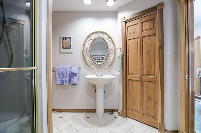 Set on nearly 6 wooded acres, this contemporary custom home - photo 26