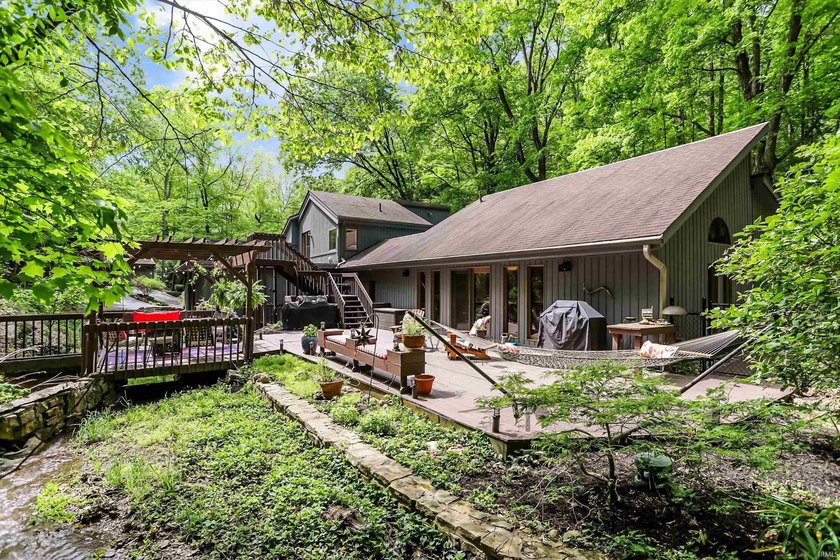 Set on nearly 6 wooded acres, this contemporary custom home - photo 32
