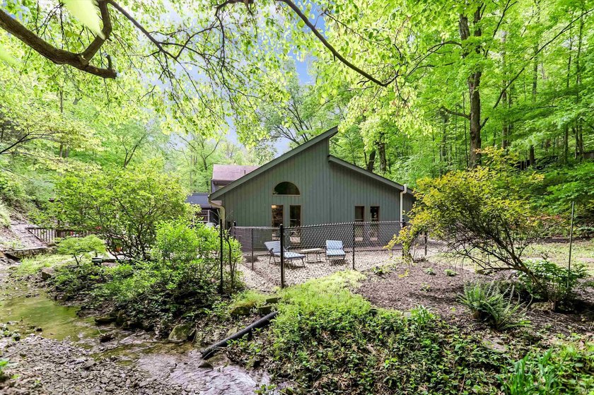 Set on nearly 6 wooded acres, this contemporary custom home - photo 33