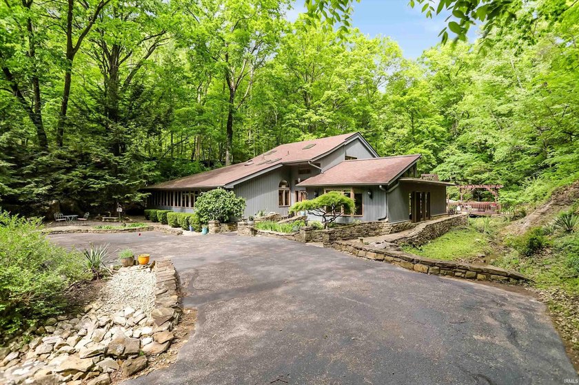 Set on nearly 6 wooded acres, this contemporary custom home - photo 36