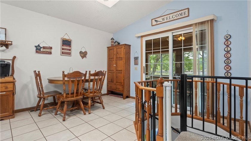 Discover peaceful lakefront living in this charming home tucked - photo 12