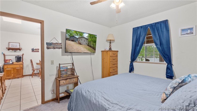 Discover peaceful lakefront living in this charming home tucked - photo 15