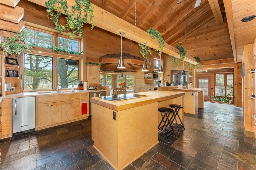 This luxury 4BR/3BA custom estate near Land O'Lakes sits on 14 - photo 15
