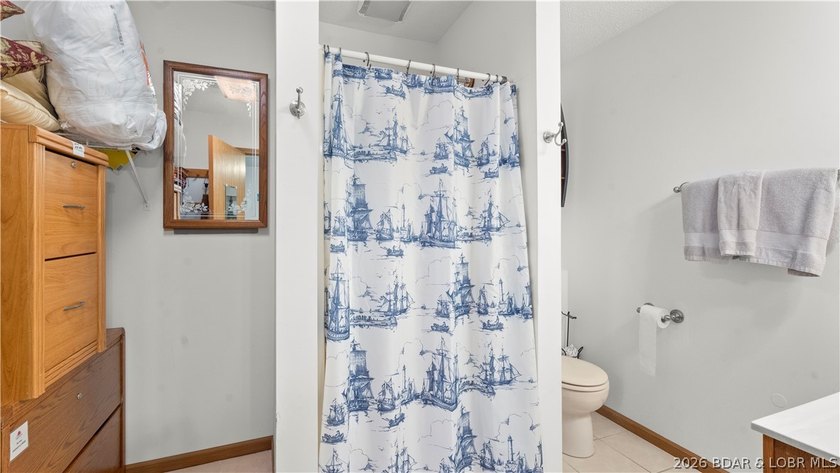 Discover peaceful lakefront living in this charming home tucked - photo 16