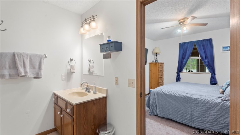 Discover peaceful lakefront living in this charming home tucked - photo 18