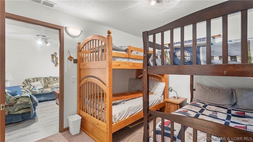 Discover peaceful lakefront living in this charming home tucked - photo 31