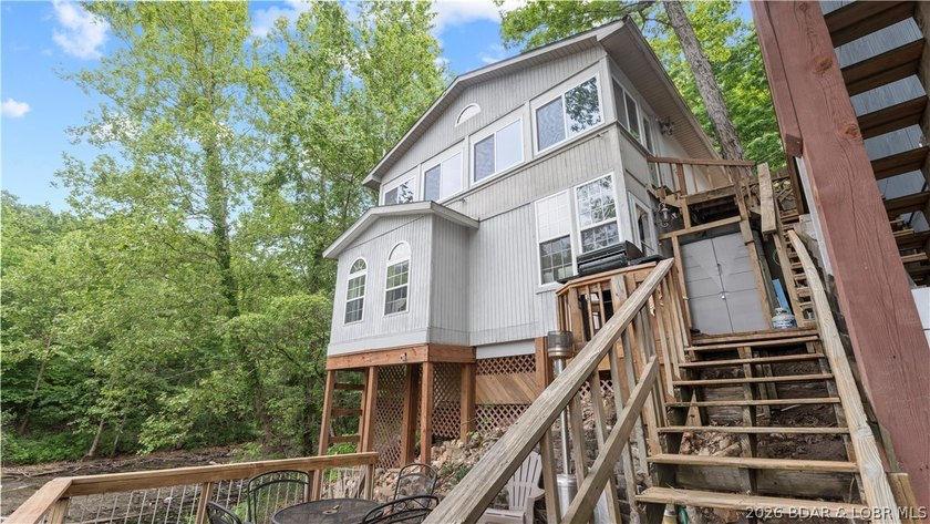 Discover peaceful lakefront living in this charming home tucked - photo 43