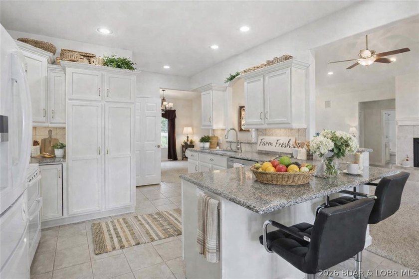 Welcome to this spacious 5-bed, 3-bath home in the highly - photo 13
