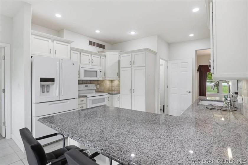 Welcome to this spacious 5-bed, 3-bath home in the highly - photo 15