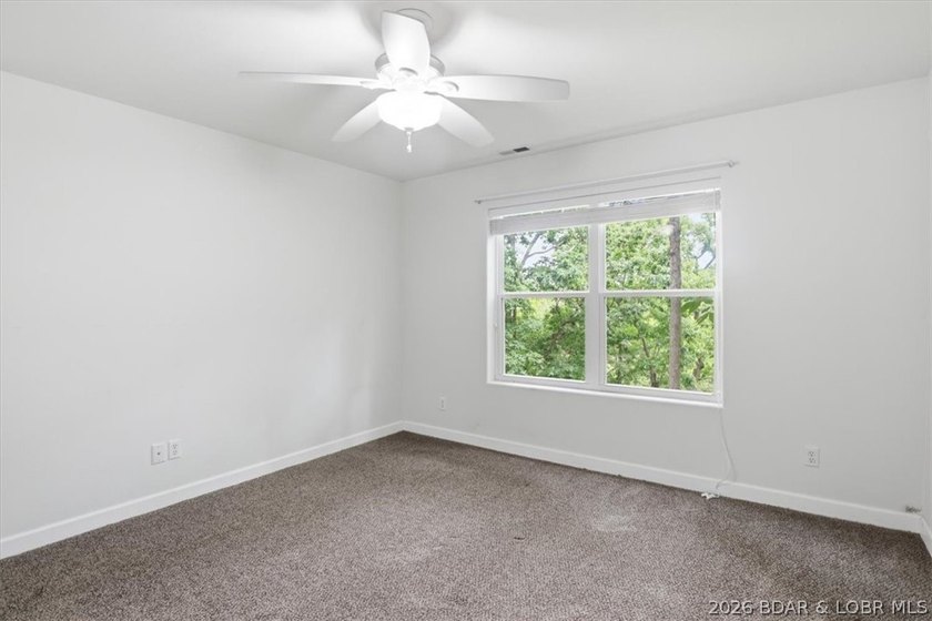 Welcome to this spacious 5-bed, 3-bath home in the highly - photo 27