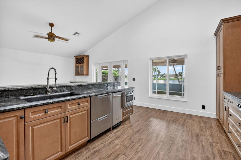 Welcome to this beautifully updated home located in the highly - photo 12
