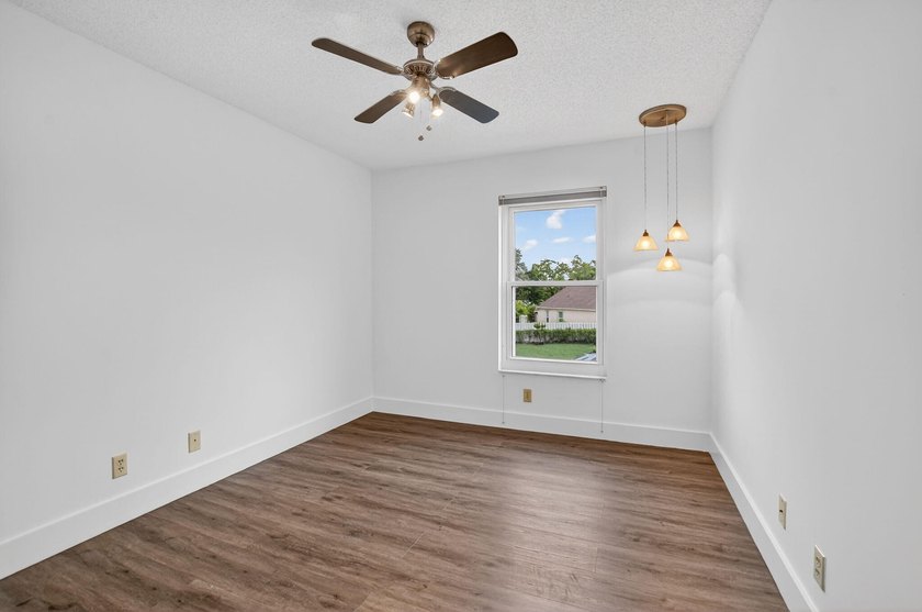 Welcome to this beautifully updated home located in the highly - photo 22