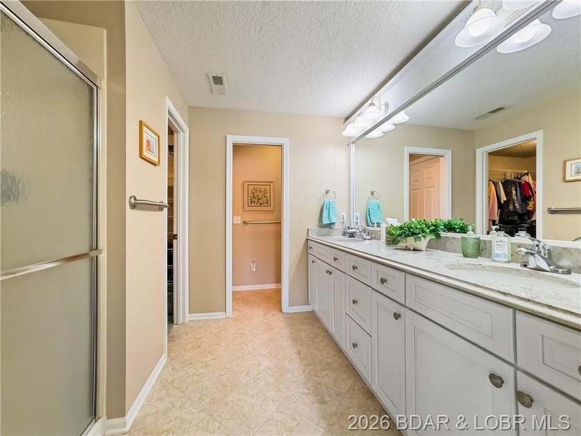 WOW! WHAT A VIEW! THIS CONDO SITS ON THE WATER'S EDGE AT LAKE OF - photo 23