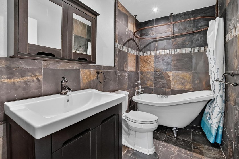 Welcome to this beautifully updated home located in the highly - photo 24