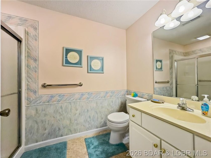 WOW! WHAT A VIEW! THIS CONDO SITS ON THE WATER'S EDGE AT LAKE OF - photo 29
