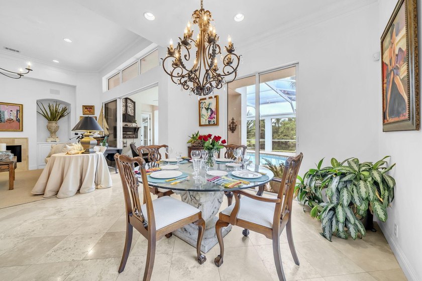 Welcome to luxury, low-maintenance living in the prestigious - photo 18