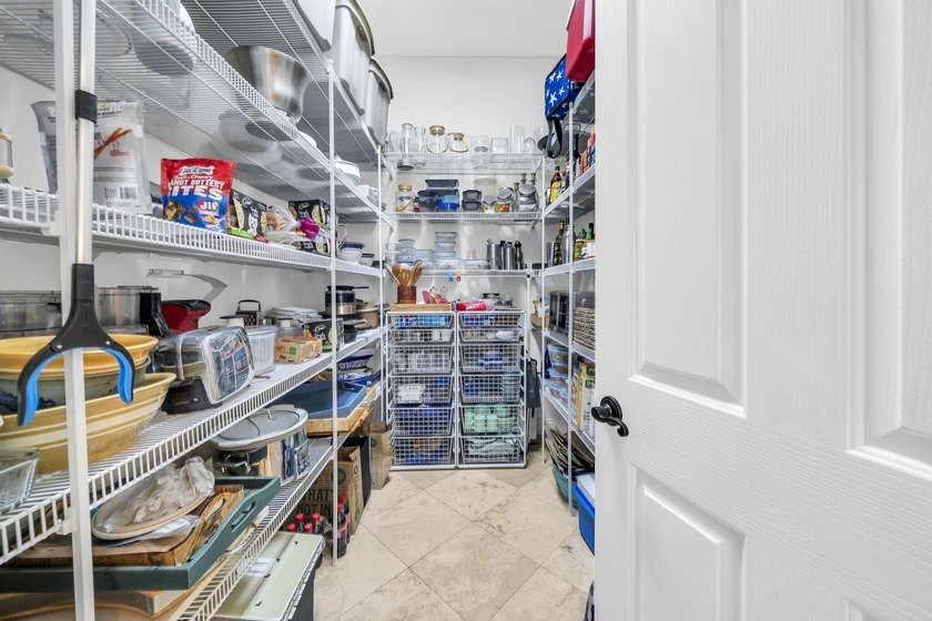 Welcome to luxury, low-maintenance living in the prestigious - photo 19