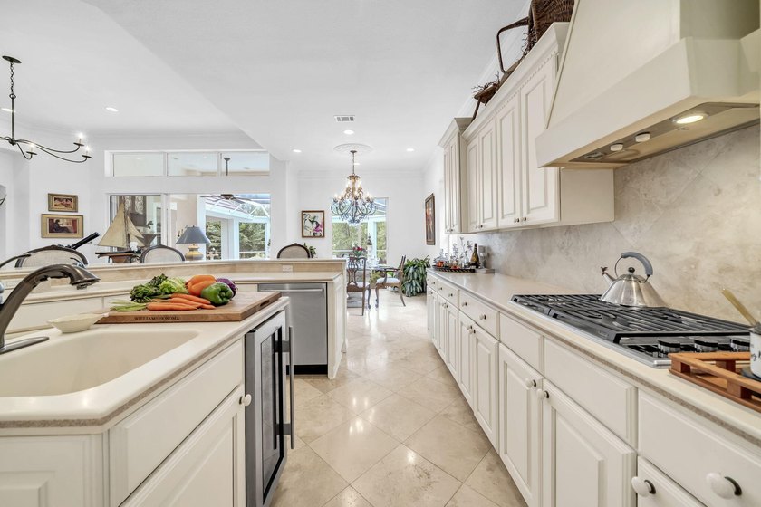Welcome to luxury, low-maintenance living in the prestigious - photo 20