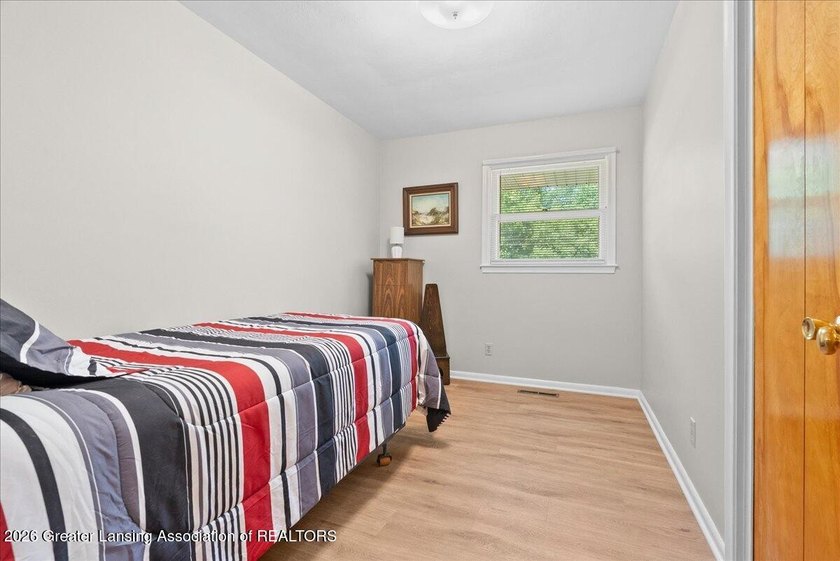 Welcome to 4089 N. Pine Dell Dr in Lansing, a well-maintained - photo 22