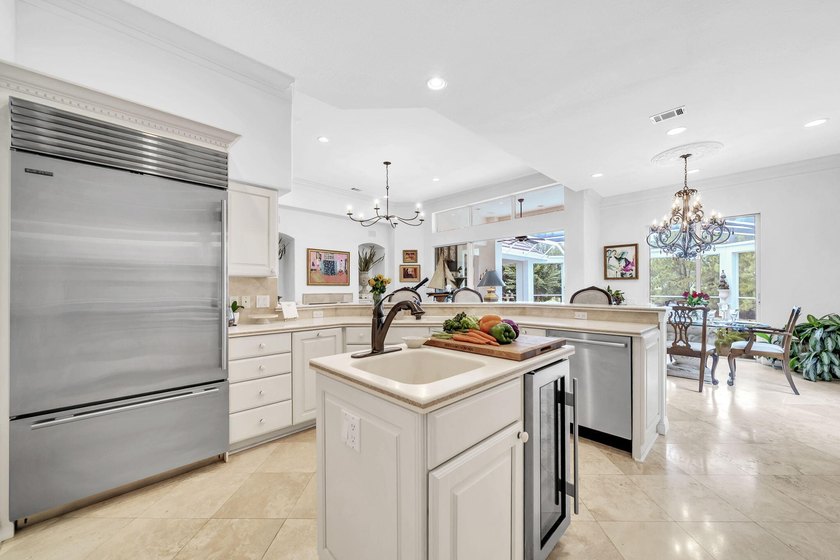 Welcome to luxury, low-maintenance living in the prestigious - photo 23