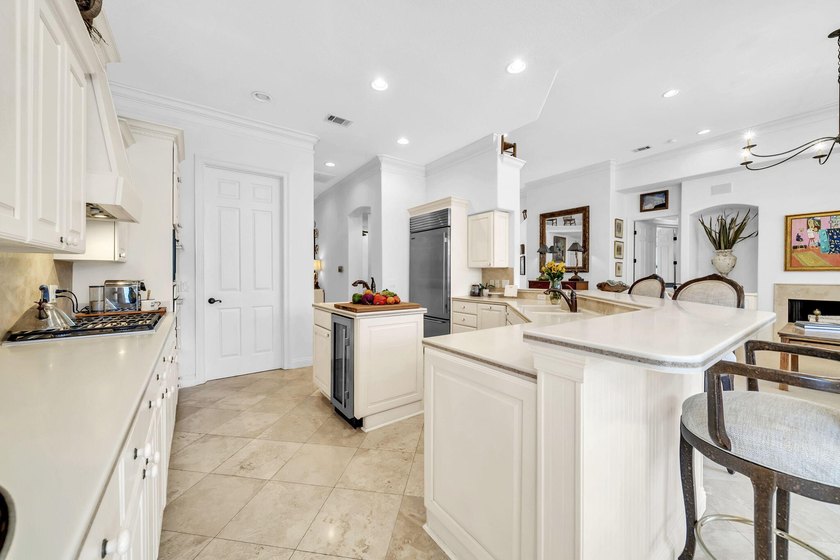 Welcome to luxury, low-maintenance living in the prestigious - photo 26