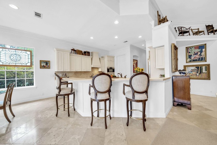 Welcome to luxury, low-maintenance living in the prestigious - photo 28