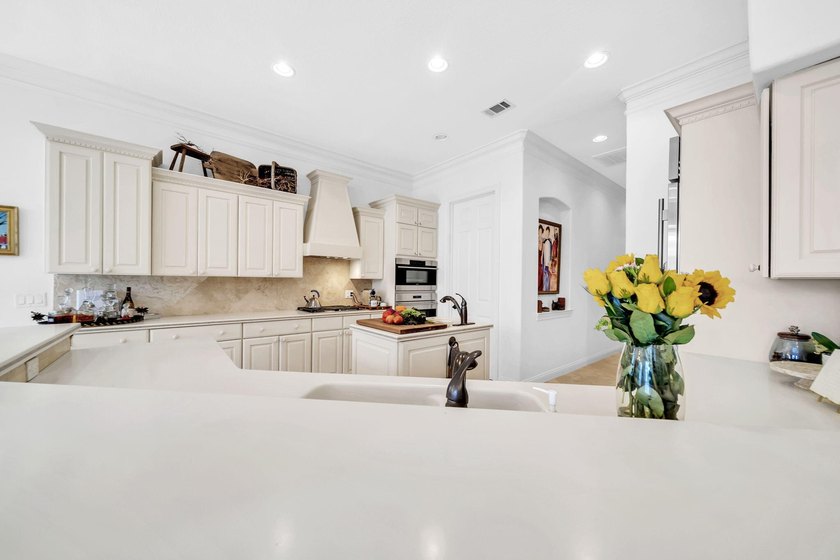 Welcome to luxury, low-maintenance living in the prestigious - photo 29