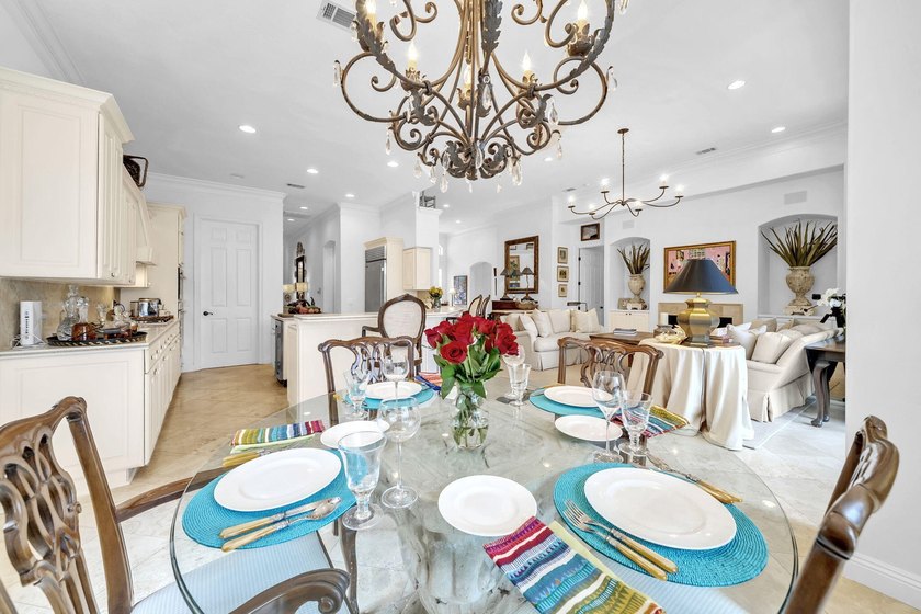 Welcome to luxury, low-maintenance living in the prestigious - photo 30