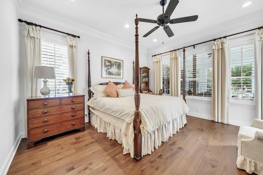 Welcome to luxury, low-maintenance living in the prestigious - photo 37