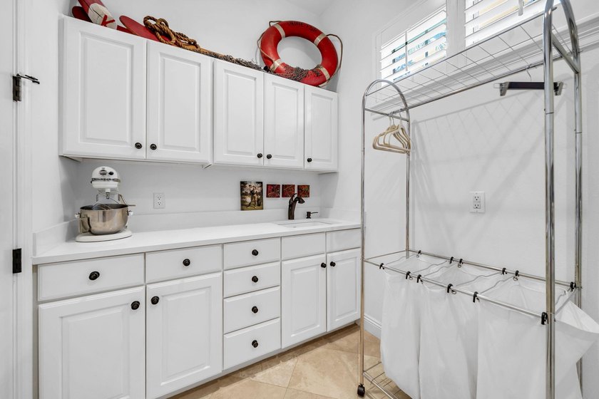 Welcome to luxury, low-maintenance living in the prestigious - photo 45