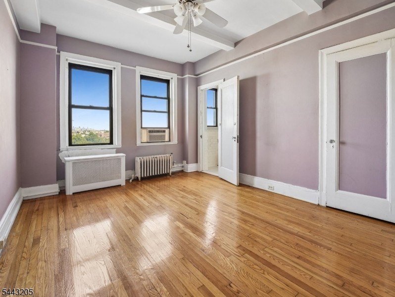 Discover the potential of this 1-bedroom residence with sweeping - photo 11