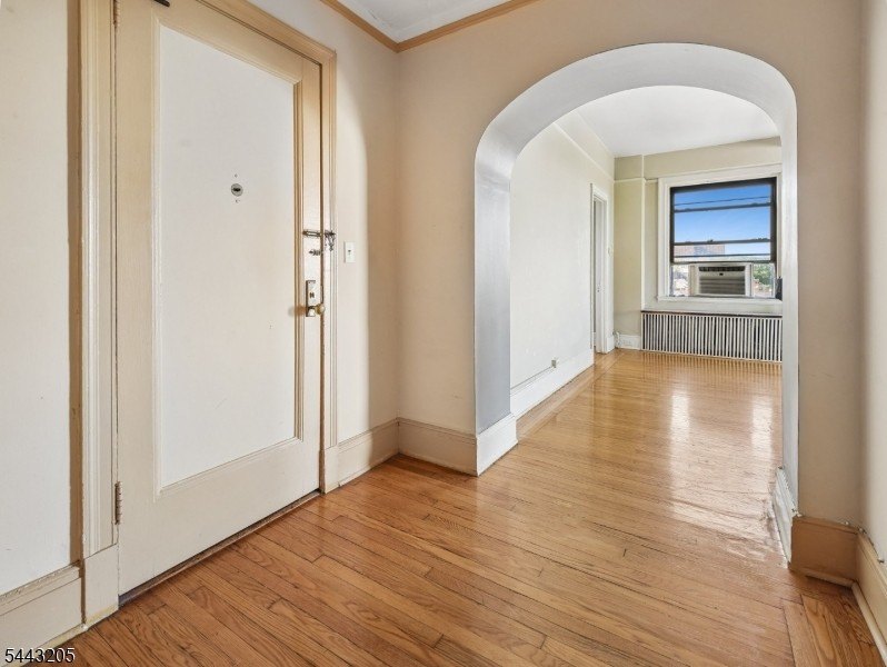 Discover the potential of this 1-bedroom residence with sweeping - photo 14